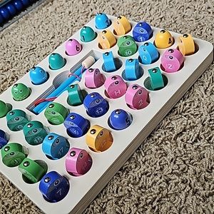 Wooden fishing game with letters and numbers